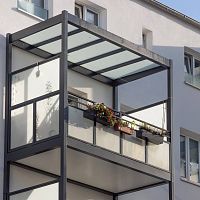 Balcony with panels with barsglassaluminum