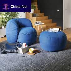 Contemporary ottoman REEFfabricwoodenround