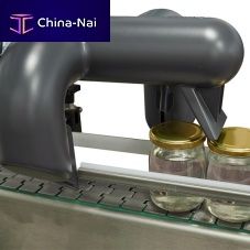 Continuous drying system for cansfor jarsfor the pharmaceutical industry