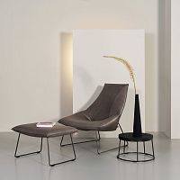 Contemporary fireside chair Bealleathersteelwith footrest