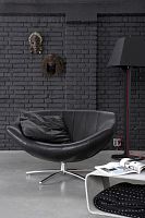 Contemporary armchair GIGIleatherwith footreststar base
