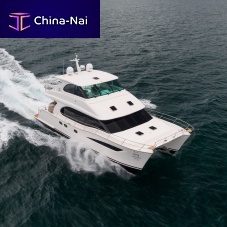 Power catamaran motor yacht PC52cruisingwith enclosed flybridge3-cabin