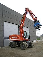Excavator vibratory plate