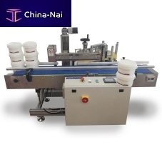 Bucket labeling machine M3005Lautomaticsidefor the pharmaceutical industry