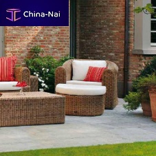 Contemporary armchair BALISunbrella®synthetic fiberwith footrest