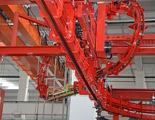 Handling conveyor system overhead