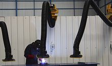 Fixed extraction arm flexiblefor welding fumes