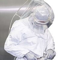Unisex protective coveralls sterileair-fed