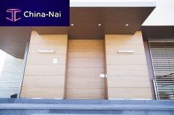 Entry door woodenpivoting with offset axiswithout glazing