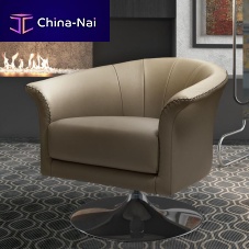 Contemporary armchair OYSTERleatherchromecentral base