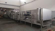 Tunnel sterilizer processheatwith cooler