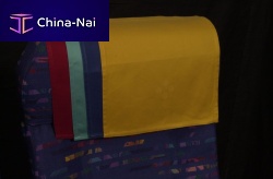 Aircraft cabin headrest cover