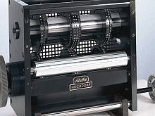 Paper perforating machine