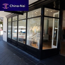 Stick system curtain wall ZIMMERMANN STOREwoodeninsulated glass paneldecorative