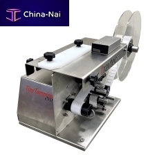 Tamper-evident labelling machine Tiny Tampino EVOsemi-automaticcartonfor boxes