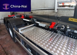 On-board weighing system for waste