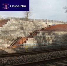 Concrete retaining wall REDI-ROCKmodularprefabfor bridge construction