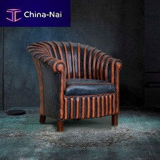 Contemporary armchair SPINEleathersolid woodhandmade