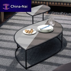 Contemporary coffee table LEAF 002enameled sandstonesandstonelacquered stainless steel base