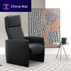 Contemporary relaxing armchair EM 110leatherfabricwith footrest