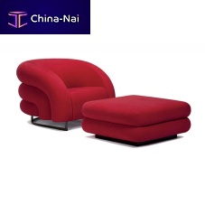 Contemporary armchair BALOONleatherfabricwith footrest
