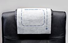Aircraft cabin headrest cover