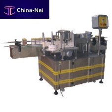 Automatic labeling machine for bottlesside