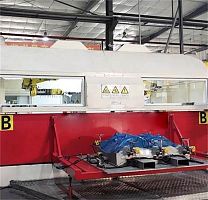 Robotic cutting system FANUC M-20iA waterjetfor fabricsfor composites
