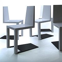 Original design chair SHADOW indoorwalnutpolished stainless steel
