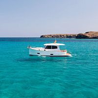 Inboard express cruiser MENORQUN 34dieselwith enclosed cockpit2-cabin