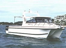 Catamaran express cruiser 3100outboarddieseltwin-berth