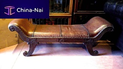 Vintage upholstered bench leatherwooden basebrown