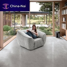 Contemporary armchair FLOATfabricwoodenwith footrest