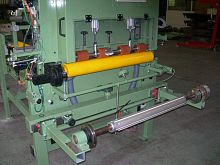 Guillotine cutting machine for fabricsunwindingelectric