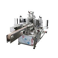Automatic label applicator for boxessidefor the pharmaceutical industry