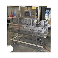 Foodstuff cutting machine TBSVPLC-controlledwith conveyor