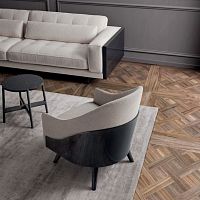 Contemporary armchair SHELLfabricwith footrestgray