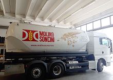 On-board weighing system for waste