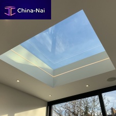 Flat roof skylight smoke controlfor ventilationwith skylight frame