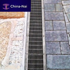 Drainage channel with grating VIBRO-BASE 100vibro-pressed concretefor public spaces