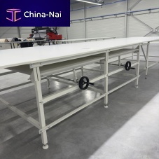 Needle roller cutting table for fabricwith drawersfor fabric padding