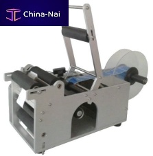 Semi-automatic labelling machine LM-150for bottlesfor chemicalsside