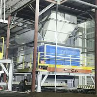 Powder charging machine
