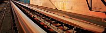 Oil resistant coating Transoilprotectivein fire-retardant fabricfor conveyor belts
