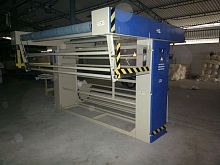 Fabric folding machine
