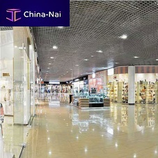 Metal suspended ceiling GRIGLIATOwoodenstripflame-retardant