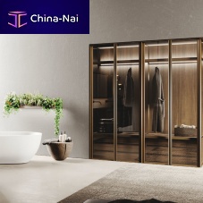 Contemporary walk-in wardrobe AVOLA GRESwoodensmoked glassaluminum