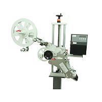 Automatic label applicator LAHfor bottlestopfor the pharmaceutical industry