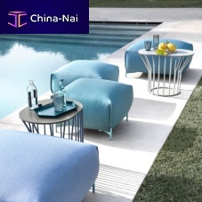 Contemporary ottoman MOCHIfabricleatherpainted metal