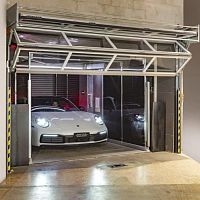 Metal elevator door COMPACTfoldingsemi-glazeddouble